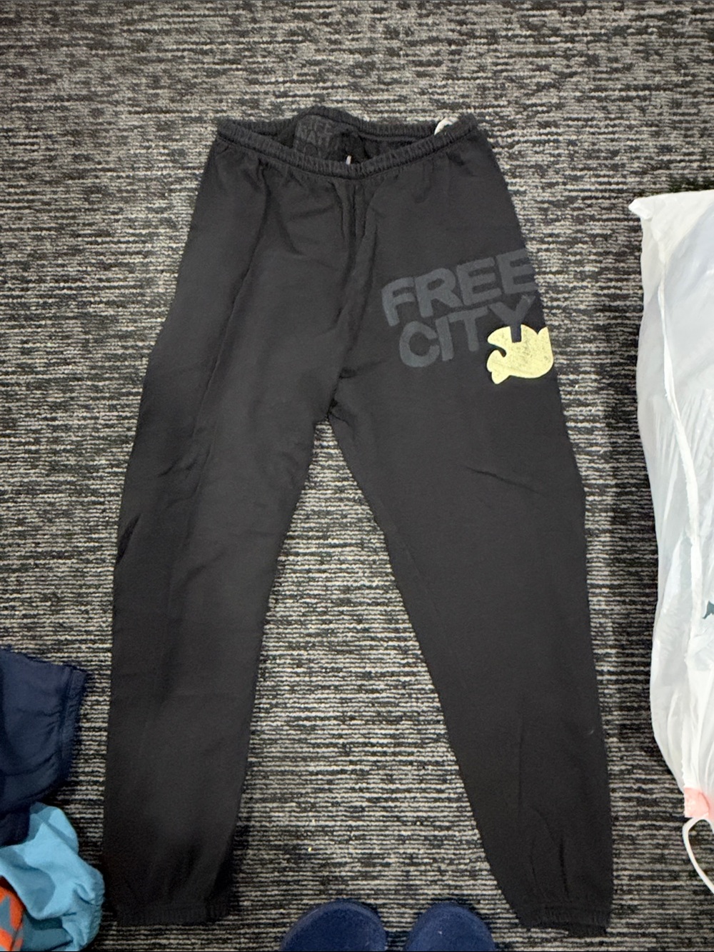 freecity Black Sweatpants with Yellow Accent Graphic